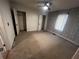 Bedroom with carpet, ceiling fan and closets at 1056 Welch Sw St, Atlanta, GA 30310