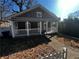 Gray house with white porch and picket fence at 1056 Welch Sw St, Atlanta, GA 30310