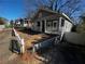 Gray house with white porch and picket fence at 1056 Welch Sw St, Atlanta, GA 30310
