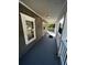 Inviting front porch with white railings and gray siding at 1056 Welch Sw St, Atlanta, GA 30310