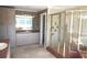 Bathroom with large shower and marble floors at 2697 Bethel Ne Rd, Conyers, GA 30012