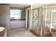 Large primary bathroom features a tile shower, vanity, and linen closet at 2697 Bethel Ne Rd, Conyers, GA 30012