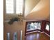 Two-story entryway with hardwood floors and chandelier at 2697 Bethel Ne Rd, Conyers, GA 30012