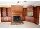 Gathering room featuring built-in shelving and a brick fireplace at 2697 Bethel Ne Rd, Conyers, GA 30012