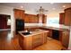 Spacious kitchen with island, stainless appliances and lots of countertop space at 2697 Bethel Ne Rd, Conyers, GA 30012