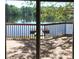 Lake view seen from a deck through sliding glass doors at 2697 Bethel Ne Rd, Conyers, GA 30012