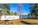 Level RV site with lake view; sunny, wooded setting at 2697 Bethel Ne Rd, Conyers, GA 30012