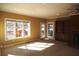 Cozy living room with natural light, fireplace and built-in bookcase at 2697 Bethel Ne Rd, Conyers, GA 30012