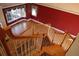 Elegant staircase with hardwood treads and white balusters at 2697 Bethel Ne Rd, Conyers, GA 30012