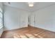 Bright bedroom with hardwood floors and white trim at 332 Shadowmoor Dr, Decatur, GA 30030