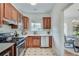 Charming kitchen with white countertops, stainless steel appliances, and classic tile flooring at 332 Shadowmoor Dr, Decatur, GA 30030