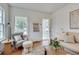 Cozy living room with hardwood floors, classic decor, and natural light creates a comfortable atmosphere at 332 Shadowmoor Dr, Decatur, GA 30030