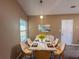 Dining room features a marble top table with seating for four at 754 Shore Dr, Lithonia, GA 30058