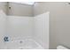 Clean bathroom with a bathtub and shower at 896 Glynn Oaks Dr, Clarkston, GA 30021