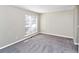 Spacious bedroom with neutral carpeting at 896 Glynn Oaks Dr, Clarkston, GA 30021