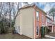 Side view of house with brick and siding at 896 Glynn Oaks Dr, Clarkston, GA 30021