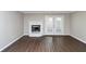 Living room with fireplace and hardwood floors at 896 Glynn Oaks Dr, Clarkston, GA 30021