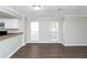 Living room with hardwood floors and large windows at 896 Glynn Oaks Dr, Clarkston, GA 30021