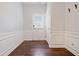 Bright foyer with wood floors and white wainscoting at 1693 Fair Oak Way, Mableton, GA 30126