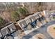 Aerial view of townhomes featuring mature trees and neighborhood streets at 1693 Fair Oak Way, Mableton, GA 30126