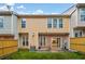 Townhouse backyard featuring a patio with grassy area, AC Unit, and wood fence at 1693 Fair Oak Way, Mableton, GA 30126
