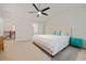 Large main bedroom featuring a ceiling fan and neutral carpeting at 1693 Fair Oak Way, Mableton, GA 30126