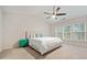 Bright bedroom with a vaulted ceiling, a ceiling fan, and large windows at 1693 Fair Oak Way, Mableton, GA 30126