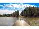 Serene lake view from a wooden dock at 178 Rydal Way, Winder, GA 30268