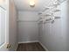 Walk-in closet with wire shelving and hanging rods at 225 Bentley Pl, Tucker, GA 30084