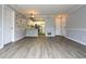 Spacious living room with grey walls and wood-look flooring at 225 Bentley Pl, Tucker, GA 30084