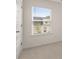 Bedroom with window and neutral walls at 297 Sound Cir, Stockbridge, GA 30281