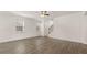 Living room featuring wood floors and natural light from windows at 297 Sound Cir, Stockbridge, GA 30281