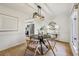 Modern farmhouse style dining room with a round table and four light colored chairs at 54 Ivy Ne Pkwy, Atlanta, GA 30342