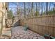 Private patio with flagstone flooring and space for potted plants at 54 Ivy Ne Pkwy, Atlanta, GA 30342