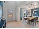 Open concept dining area with light hardwood floors at 2416 Cadenza Cir, Dacula, GA 30019