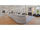 Open concept living room and kitchen with hardwood floors at 2416 Cadenza Cir, Dacula, GA 30019