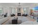 Spacious living room with fireplace and large windows at 2416 Cadenza Cir, Dacula, GA 30019