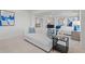 Relaxing main bedroom suite with sitting area and plenty of natural light at 2416 Cadenza Cir, Dacula, GA 30019