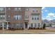 Attractive three-story townhome with landscaping at 3420 Reagan Way # 89, Lawrenceville, GA 30044