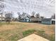 View of the home from the backyard, showing a storage shed at 374 Hawkins St, Marietta, GA 30060
