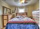 Spacious bedroom with wooden furniture and ample storage at 374 Hawkins St, Marietta, GA 30060