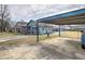 House with carport and fenced backyard at 374 Hawkins St, Marietta, GA 30060