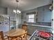 Cozy kitchen with a round table and gray cabinets at 374 Hawkins St, Marietta, GA 30060