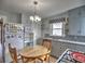 Bright kitchen featuring gray cabinets and a round table at 374 Hawkins St, Marietta, GA 30060