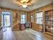 Home office with wood paneling, desk, and hardwood floors at 374 Hawkins St, Marietta, GA 30060