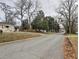 Residential street view showcasing neighborhood homes and landscaping at 374 Hawkins St, Marietta, GA 30060