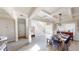 Dining room area with stairs, adjacent to living room at 4596 Birch Way, Loganville, GA 30052
