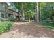 Wooded backyard with pine straw ground cover at 2105 Country Park Dr, Smyrna, GA 30080