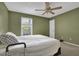 Bedroom with ceiling fan, neutral walls and carpeted floor at 2105 Country Park Dr, Smyrna, GA 30080