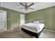 Bedroom with ceiling fan, neutral walls and carpeted floor at 2105 Country Park Dr, Smyrna, GA 30080